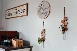 Two Hanging Single Propagation Stations in Monstera Leaf Pattern On Wall with Other Wall Decor